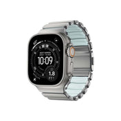 Řemínek pro Apple Watch 45/46/49 mm Nomad Stratos Natural Titanium FKM - Icy Blue Glow